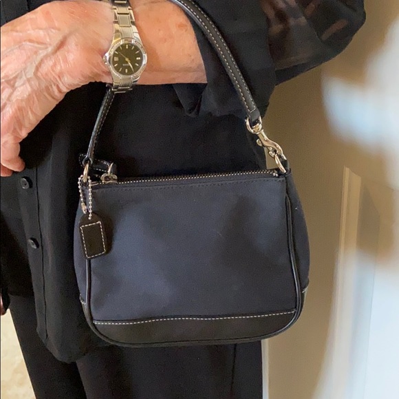 Coach Handbags - Almost new Coach Dark Navy Mini Purse